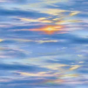 May include: A digital print featuring a sky filled with soft, horizontal clouds in shades of blue, white, and pale yellow. A bright, diffused light source glows from behind the clouds, creating a warm, golden center against the cool blue tones.
