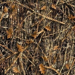 May include: Camouflage pattern featuring a blend of brown, tan, and black. The design includes branches, leaves, and a bark-like texture, creating a natural, woodland aesthetic. Ideal for outdoor apparel and accessories.