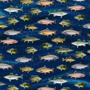 May include: A repeating pattern of various fish species in shades of yellow, orange, silver, and pink against a dark blue background. The fish are arranged in a seemingly random pattern, creating a dynamic and aquatic theme.