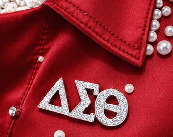 Pin con símbolo de diamantes de imitación DST