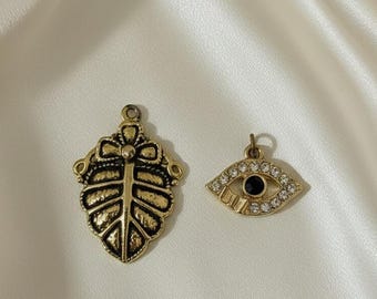 Vintage Rhinestone Pendants: Leaf & Evil Eye Set