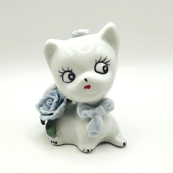 Vintage Large Headed Cat Figurine with Pastel Blue Flower Accent
