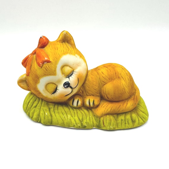 Decorative hand painted porcelain sleeping cat figurine