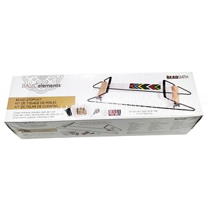 May include: A Basic Elements bead loom kit. The box features the text "BEAD LOOM KIT" and "Create necklaces, bracelets, belts, & more!" The loom itself is black with wooden handles and a beaded design in the center.