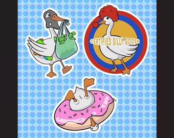 May include: Three cartoon goose stickers. One goose is wearing a black ski mask and carrying a green grocery bag. Another goose is wearing a red and white clown hat and is inside a red, white, and blue circle with the text "CERTIFIED SILLY GOOSE". The third goose is upside down in a pink donut with white sprinkles.