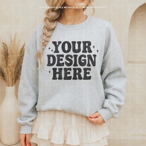 May include: A light gray sweatshirt with the text "YOUR DESIGN HERE" in black, with star accents. The top of the image reads "THIS IS A DIGITAL FILE. NO PHYSICAL ITEMS WILL BE DELIVERED."