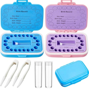 May include: A baby tooth storage kit with two blue and pink boxes, each with a chart to record the baby's birth information. The boxes have a compartment for storing teeth with labels for canine, incisor, and molar. The kit also includes two clear tubes and a pair of tweezers.