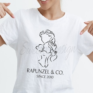 May include: White t-shirt with a black line drawing of Rapunzel with flowers in her hair. The text "Rapunzel & Co. Since 2010" is printed below the image.