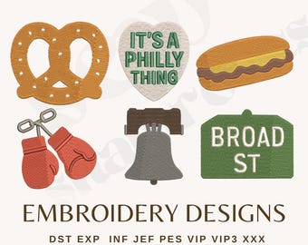 May include: Embroidery designs featuring a pretzel, a heart with "IT'S A PHILLY THING", a hot dog, boxing gloves, the Liberty Bell, and a "BROAD ST" sign. The text "EMBROIDERY DESIGNS" is below the images.