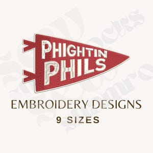 May include: A red pennant-shaped embroidery design with the words "PHIGHTIN PHILS" in white, outlined in a textured style. Below, the text "EMBROIDERY DESIGNS" and "9 SIZES" are displayed in a brown font.