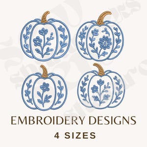May include: Four blue and white embroidered pumpkin designs with brown stems. Each pumpkin features a floral design in the center and leaf accents. The text "EMBROIDERY DESIGNS" and "4 SIZES" are displayed below the pumpkins.