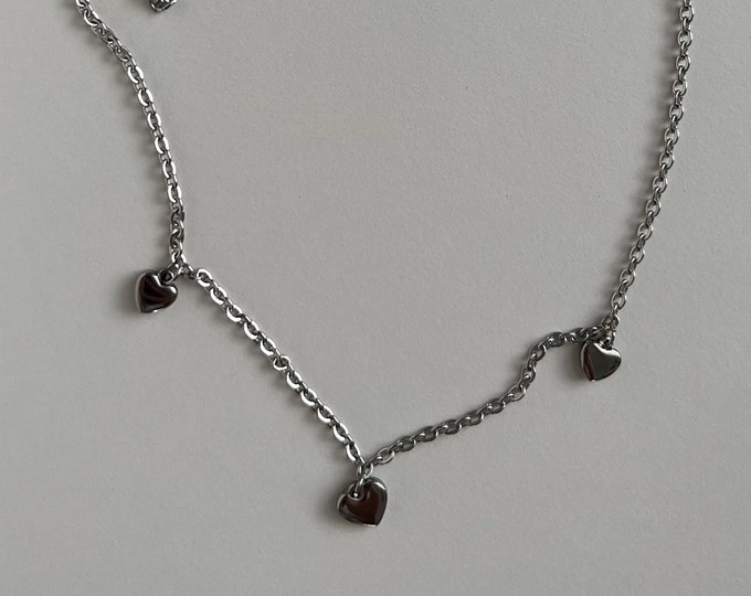 Three heart charm necklace