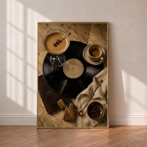 May include: A framed wall art print featuring a black vinyl record labelled After Hours, a glass of espresso martini with three coffee beans, a small cup of coffee, a dark brown notebook, a gold lighter, a gold spoon, and a bowl of coffee beans.