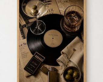 May include: A framed print featuring a black vinyl record labeled After Dark, a martini glass with two green olives, a glass of amber liquid with ice, a matchbox labeled Le Club Jazz Bar, a metal lighter, and a small bowl of green olives.