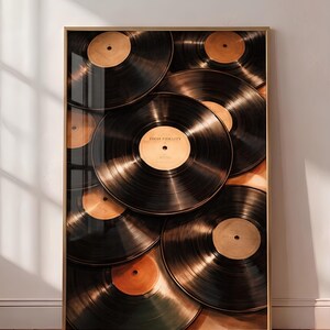May include: A framed vertical wall art print featuring a collage of overlapping black vinyl records with tan center labels. The central record prominently displays the text "HIGH FIDELITY" printed in black on its tan circular label.