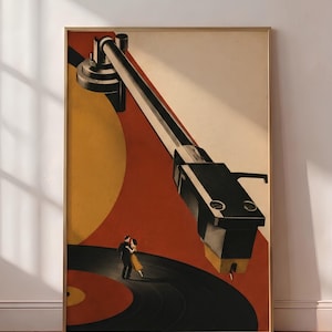 Puede incluir: Una lámina de arte enmarcada que muestra el brazo de un tocadiscos negro sobre un disco de vinilo. Sobre el disco, dos pequeñas figuras están bailando. El fondo presenta formas geométricas llamativas en colores rojo, amarillo y blanco roto.