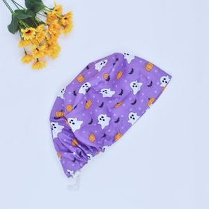 Funny Halloween Boo Ghosts on Purple Ponytail Scrub Cap for Women with Ties Elastic Pouch Spooky Fall Surgical Hat, Satin lined Scrub Cap