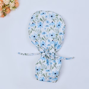 Daisy Delight Ponytail scrub cap, Surgical cap women. Satin Lined Option Surgical cap with ponytail. Satin Lined scrub cap.
