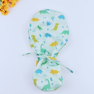 Dinosaur Ponytail scrub cap, Surgical cap women. Satin Lined Option Surgical cap with ponytail, Scrub caps for women, Satin lined scrub cap.