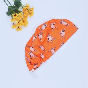 Funny Halloween Boo Ghosts on Orange Ponytail Scrub Cap for Women with Ties Elastic Pouch Spooky Fall Surgical Hat, Satin lined Scrub Cap