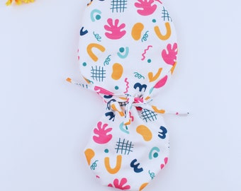 Cuffia chirurgica con coulisse: cuffia chirurgica in cotone con lacci, disponibile anche con fodera in raso.