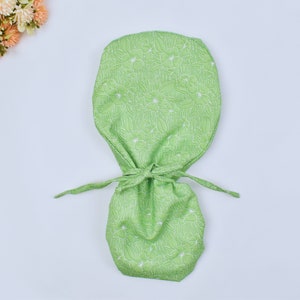 Green Floral Ponytail scrub cap, Surgical cap women. Satin Lined Option Surgical cap with ponytail. Satin Lined scrub cap.