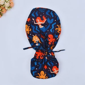 Women&#39;s European Style Surgical Scrub Cap, Mermaid Print, Satin Lined Option Surgical cap with ponytail. Satin lined scrub cap