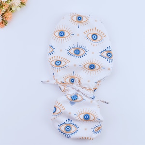 Evil Eye Ponytail Scrub Cap: Satin Lined Surgical Hat