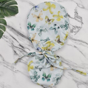 Butterflies ponytail scrub cap, Satin Lined scrub cap. Scrub cap with ponytail holder.