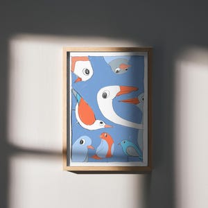 May include: A framed illustration of a group of birds with blue, white, and orange colors on a blue background.