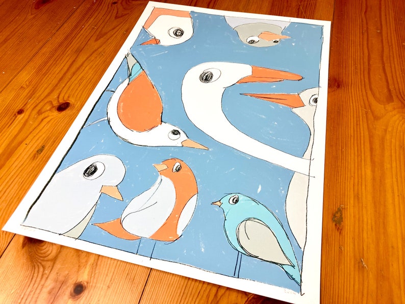 May include: A colorful illustration of a group of birds with different colors and shapes. The birds are on a blue background with white accents. The birds are all looking in different directions.
