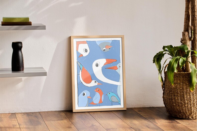 May include: A framed print of a colorful abstract illustration featuring various birds with blue, orange, and white colors on a blue background.