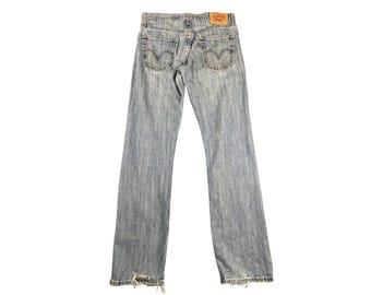 Vaqueros Levi's 514 Slim Straight vintage, talla 30 L32, denim Y2K, lavado medio, corte relajado desgastado