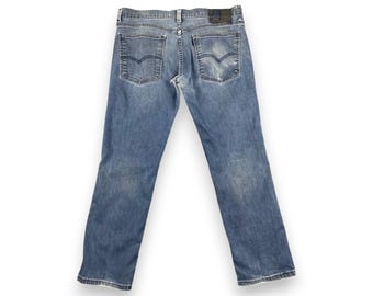 Vaqueros Levi's 511 vintage de corte ajustado / Mezclilla elástica desgastada con lavado oscuro versátil / Corte moderno a medida /