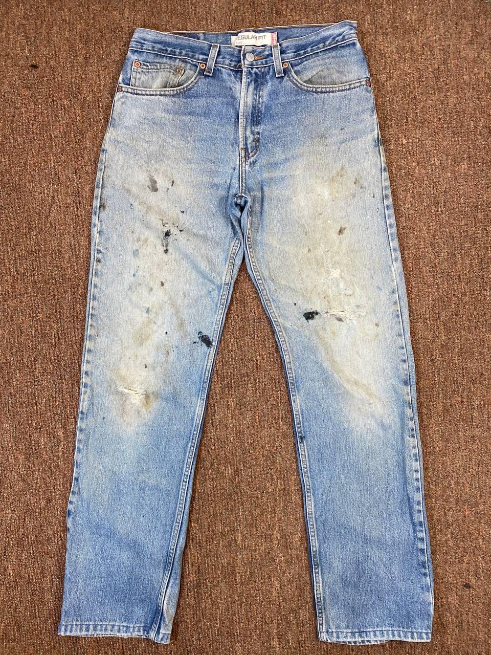 Vintage Levi's 505 Jeans – Light Wash Distressed Denim Workwear