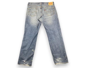 Vintage Levi's 559 relaxte rechte jeans W36 L32 | Distressed denim met verfspatten | Werkkleding in grunge-stijl Y2K