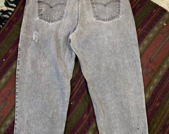 Jeansy Vintage Levi's 550 | Jasnoniebieskie, luźne jeansy z lat 90. (W38, L32)