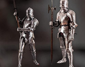 May include: Two knights in full plate armor stand holding weapons. The knight on the left is holding a spear with a pointed tip. The knight on the right is holding a halberd with a spiked head. Both knights are wearing helmets with visors.