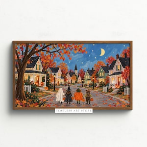 May include: A framed horizontal art print titled TIMELESS ART STORE depicting a neighborhood street at night during autumn. Four children in Halloween costumes walk down the road past houses with glowing windows, orange trees, and a crescent moon.