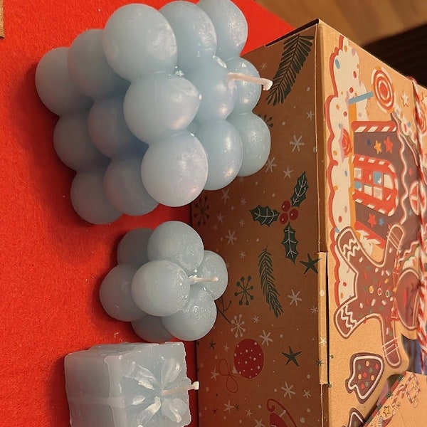 Gift box with handmade candles in blue / Christmas candles