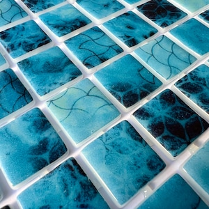 Glass mosaic tiles in shades of blue for crafting and decorating #VID
