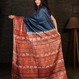 This is a horizontal half-and-half saree.
