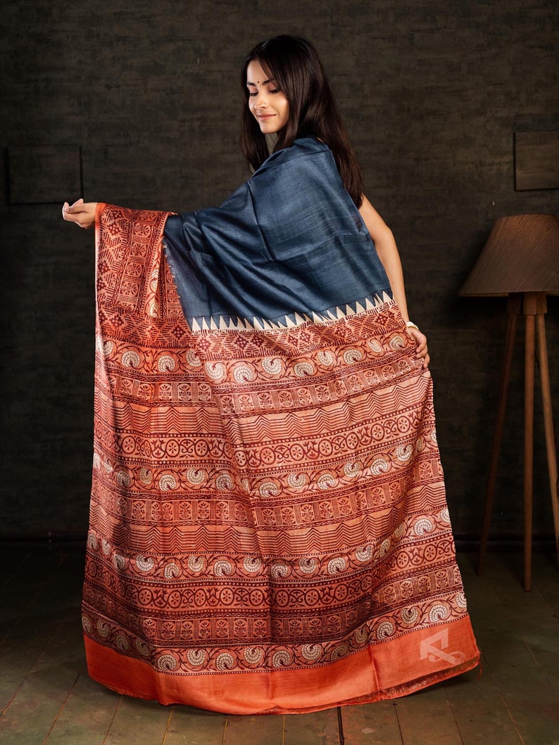 This is a horizontal half-and-half saree.