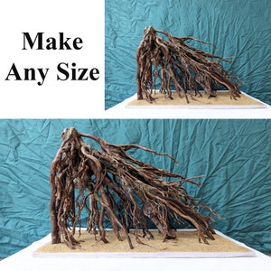 May include: A large, brown, tree root sculpture with a textured surface. The sculpture is displayed on a light brown base. The text "Make Any Size" is visible in the image.