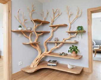 May include: A corner shelving unit constructed from light-colored natural wood branches that extend upward like a tree. The structure features multiple flat, horizontal wooden shelves at varying heights, providing display space for small potted plants, books, and decorative objects.