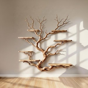 May include: A unique wall-mounted shelf in the shape of a tree. The shelf is made of natural wood and features multiple platforms of varying sizes. The tree-like structure is mounted on a neutral-colored wall, creating a rustic and artistic display.
