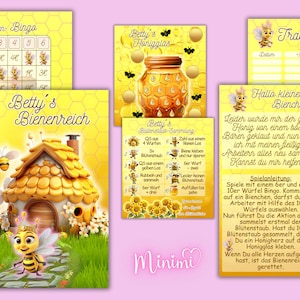Könnte beinhalten: Ein Satz druckbarer Spielkarten mit Bienen-Motiv. Die Karten beinhalten eine Bingokarte, ein Honigglas, einen Tracker und ein Spielbrett mit einem Bienenstock und einer Biene. Der Text auf den Karten lautet "Betty's Bienen-Bingo", "Betty's Honigglas", "Tracker", "Hallo kleines Bienchen!" und "Betty's Bienenreich".