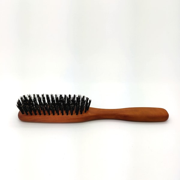 Hairbrush with wild boar bristles made of pear wood