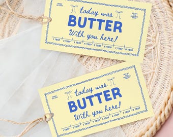 May include: Two yellow gift tags with blue text that reads "today was BUTTER With you here!". The tags have a decorative border and a string for attaching. Measurements are in tablespoons.