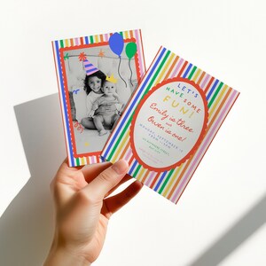 May include: Two colorful birthday party invitations. One features a black and white photo of two children wearing party hats, with balloons and a red border. The other invitation has text that reads "Let's Have Some Fun! Emily is three and Owen is one!"
